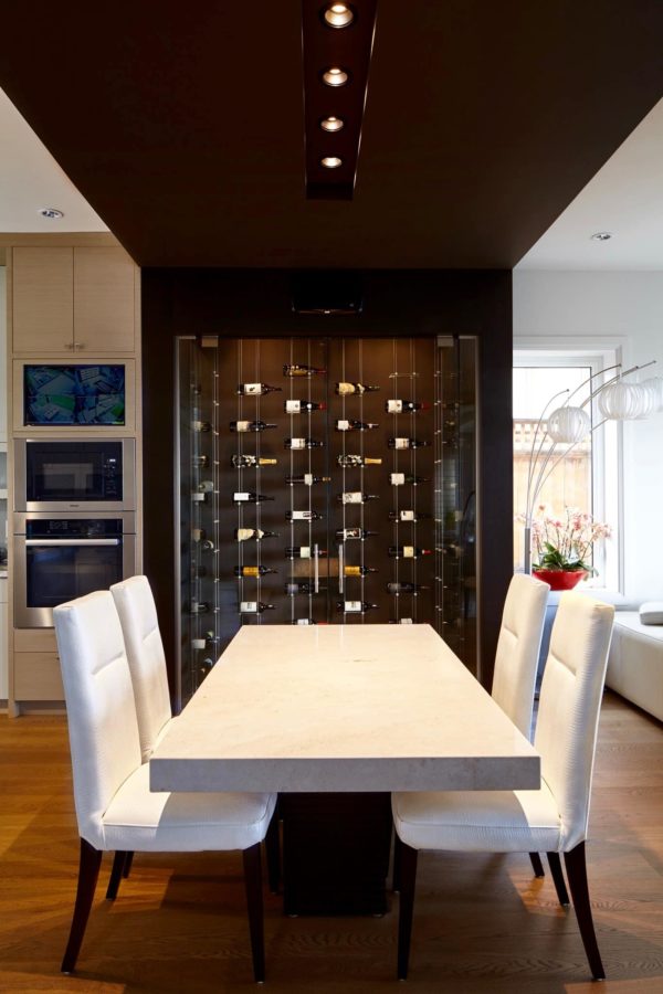 The Float Wine Display System Adds a Luxurious Touch to the Dining Area of This Home