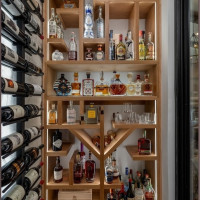 The glow on the sides of this custom wooden wine rack are from the channel lights installed.